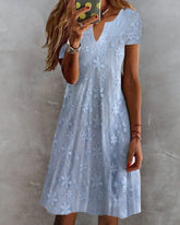 Elegant spetsblommig kortärmad klänning